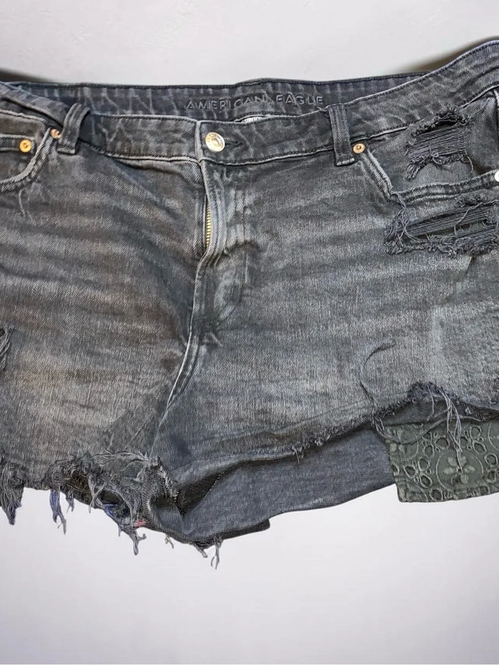 American Eagle Distressed Black Denim Shorts with Crochet Patchwork Trim sz 16
